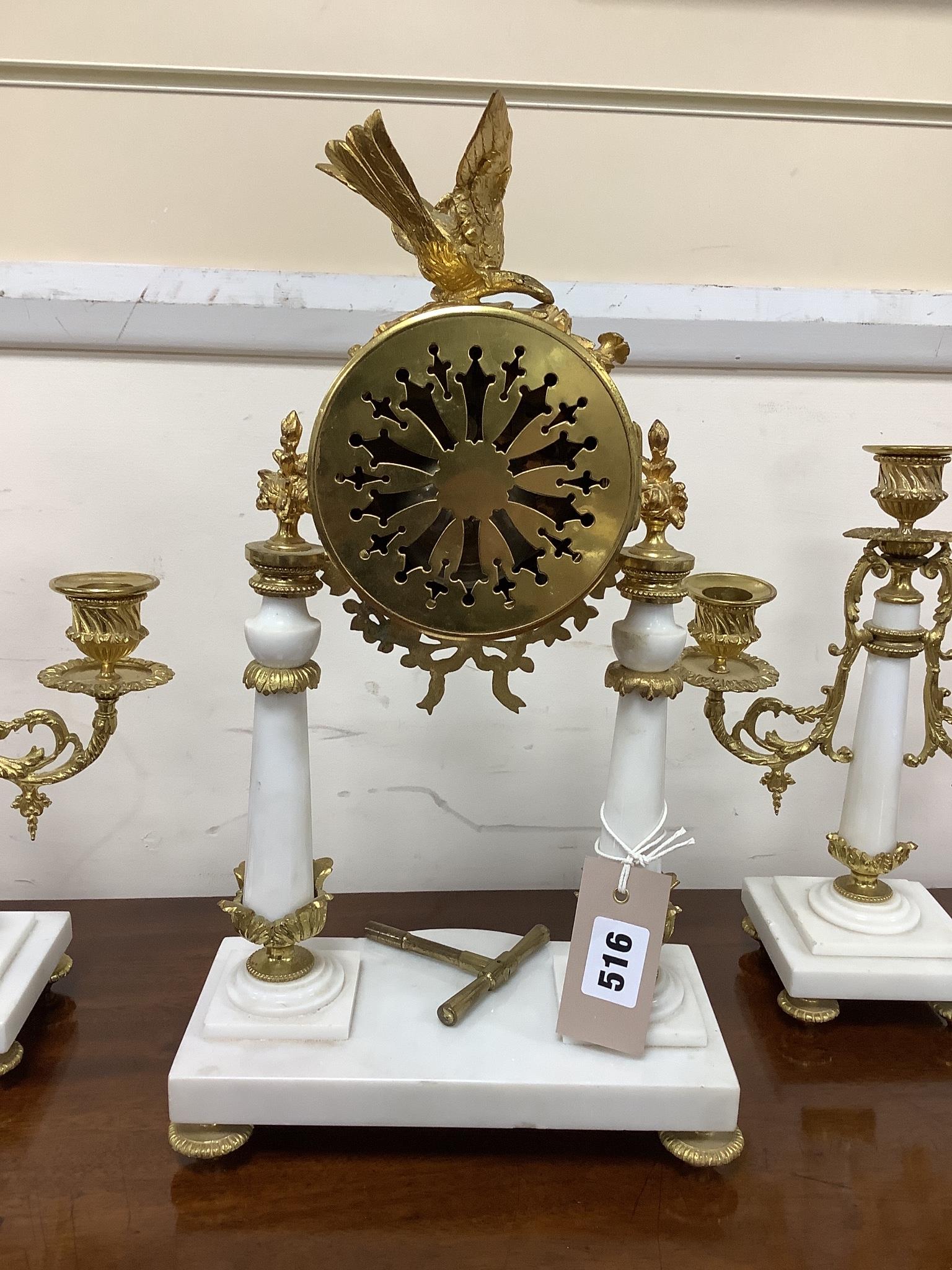 A French white marble and ormolu clock garniture, c.1900, no pendulum